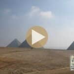 Pyramids of the Giza Plateau under a blue sky with possible hidden structures beneath