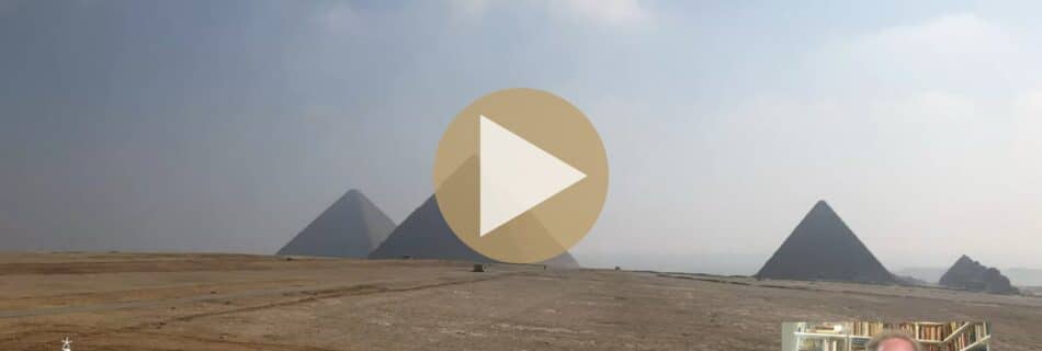 Pyramids of the Giza Plateau under a blue sky with possible hidden structures beneath